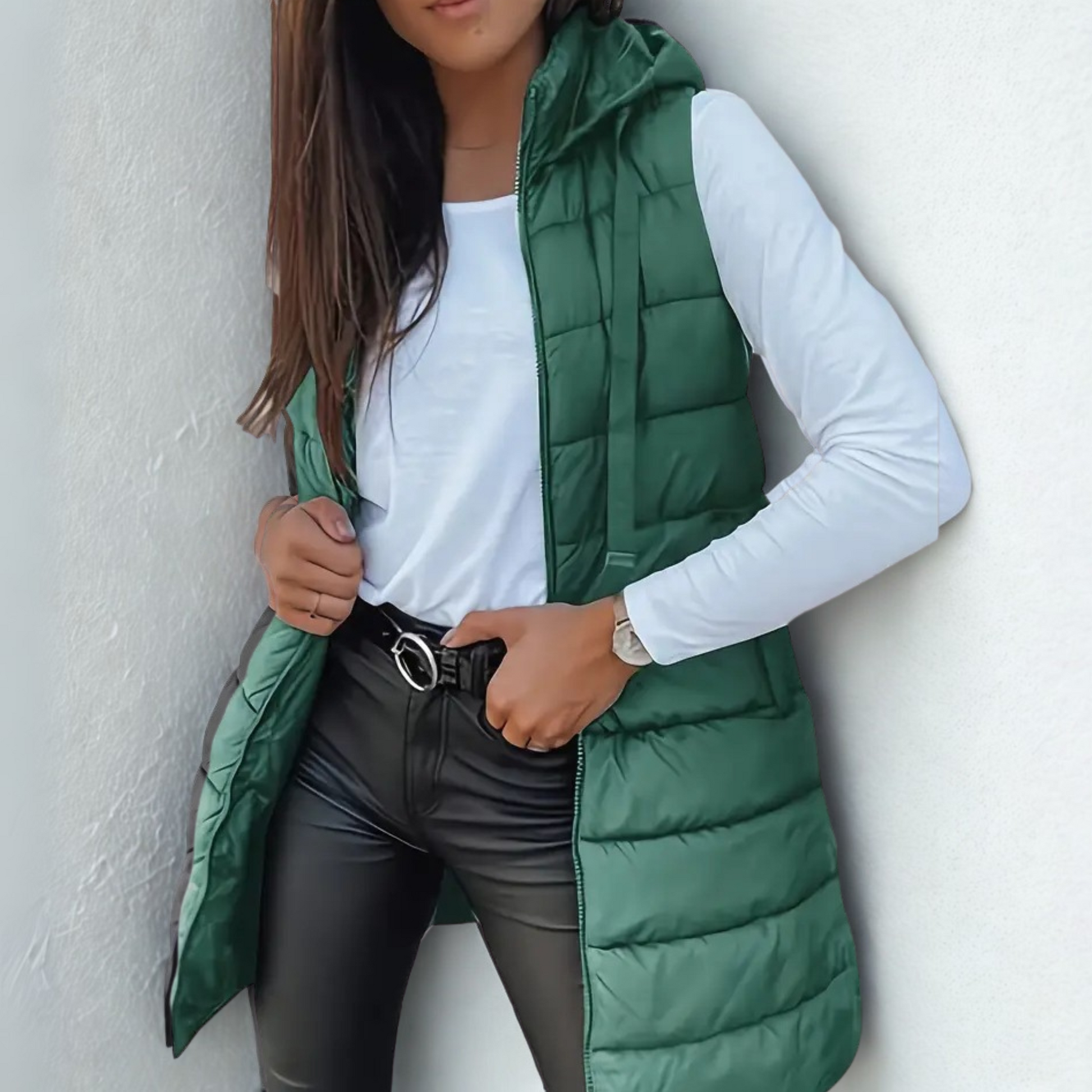 Women's long hooded puffer vest lightweight quilted longline silhouette sleeveless warmth