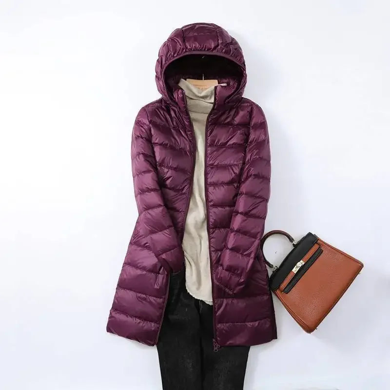 Women's navy blue packable puffer jacket with removable hood, slim fit for outdoor and city wear