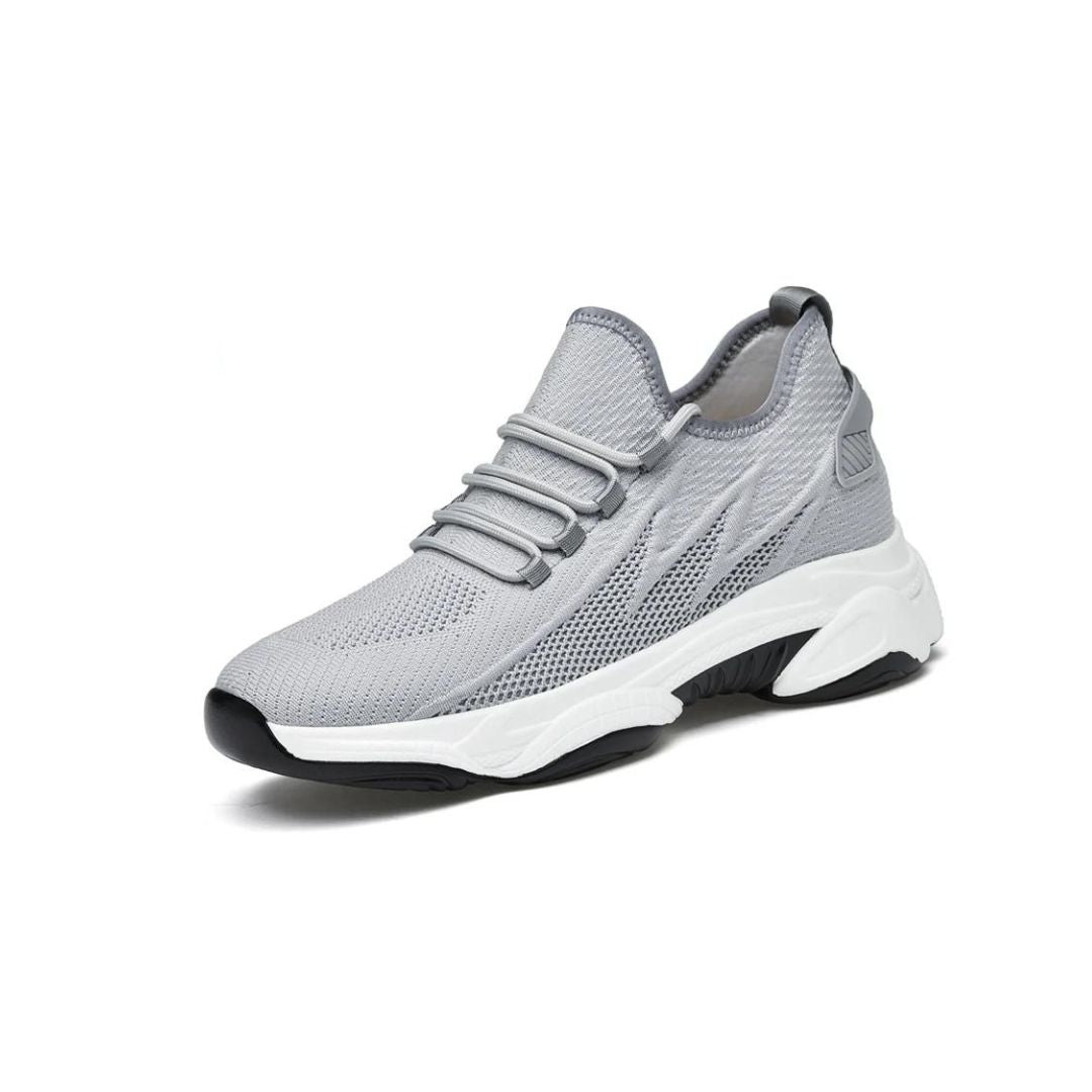 White lightweight mesh slip-on sport sneakers with breathable upper and cushioned sole