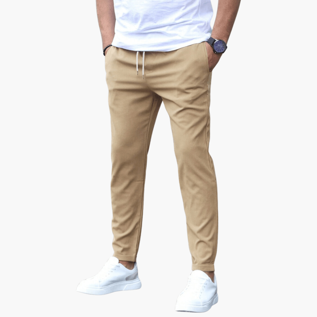 Men's slim fit stretch trousers in neutral tone, flexible adaptive cut for all-day comfort