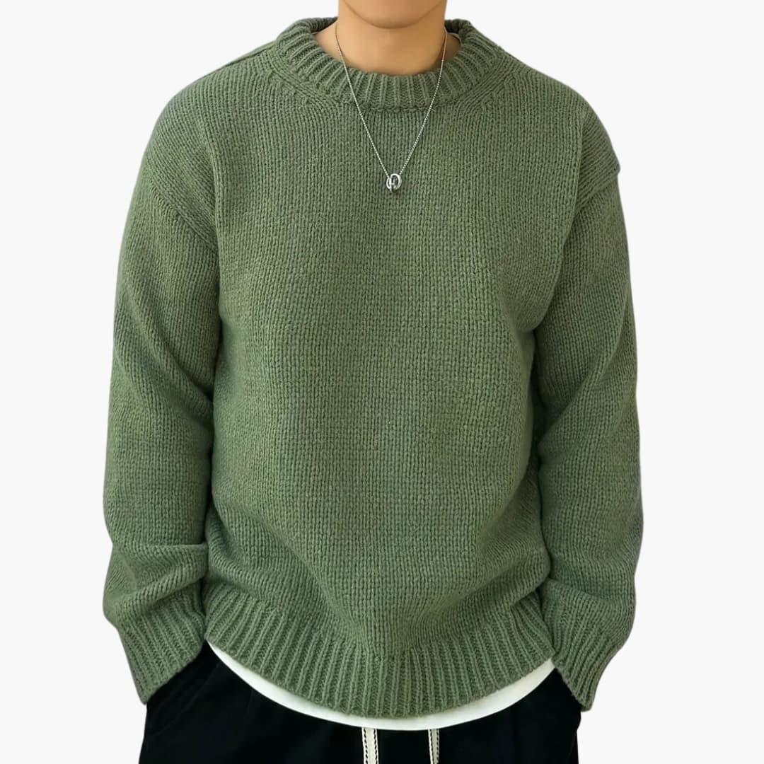 Elegant gray knitted sweater relaxed fit cozy ribbed texture versatile everyday style