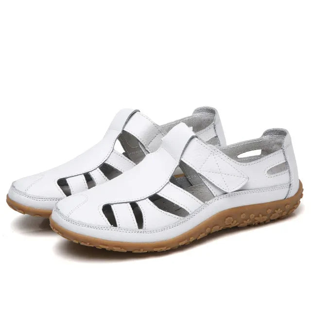 Women's casual leather sandals in neutral tones, sneaker-inspired silhouette with velcro strap closure