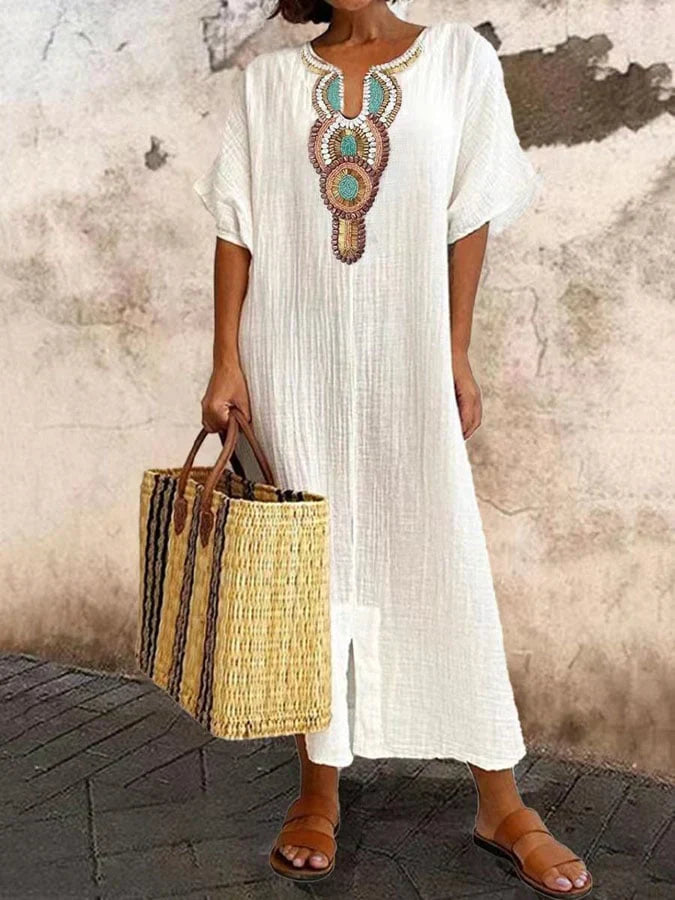 Women's boho chic flowing kaftan dress with ethnic embroidery details, relaxed draped silhouette
