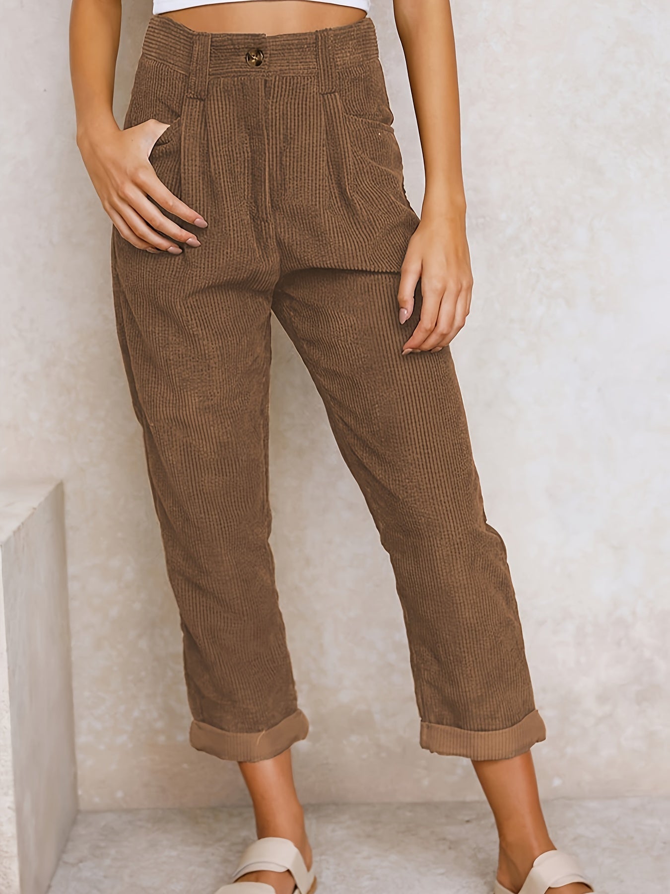 Women's beige corduroy straight-leg trousers with elegant office-ready cut and timeless silhouette