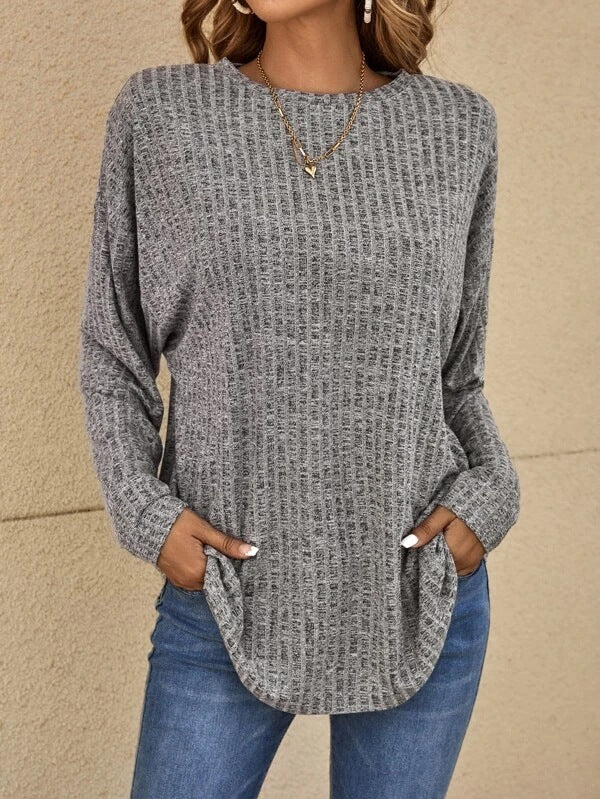Women's relaxed fit ribbed knit pullover sweater in soft neutral tones with long sleeves casual style
