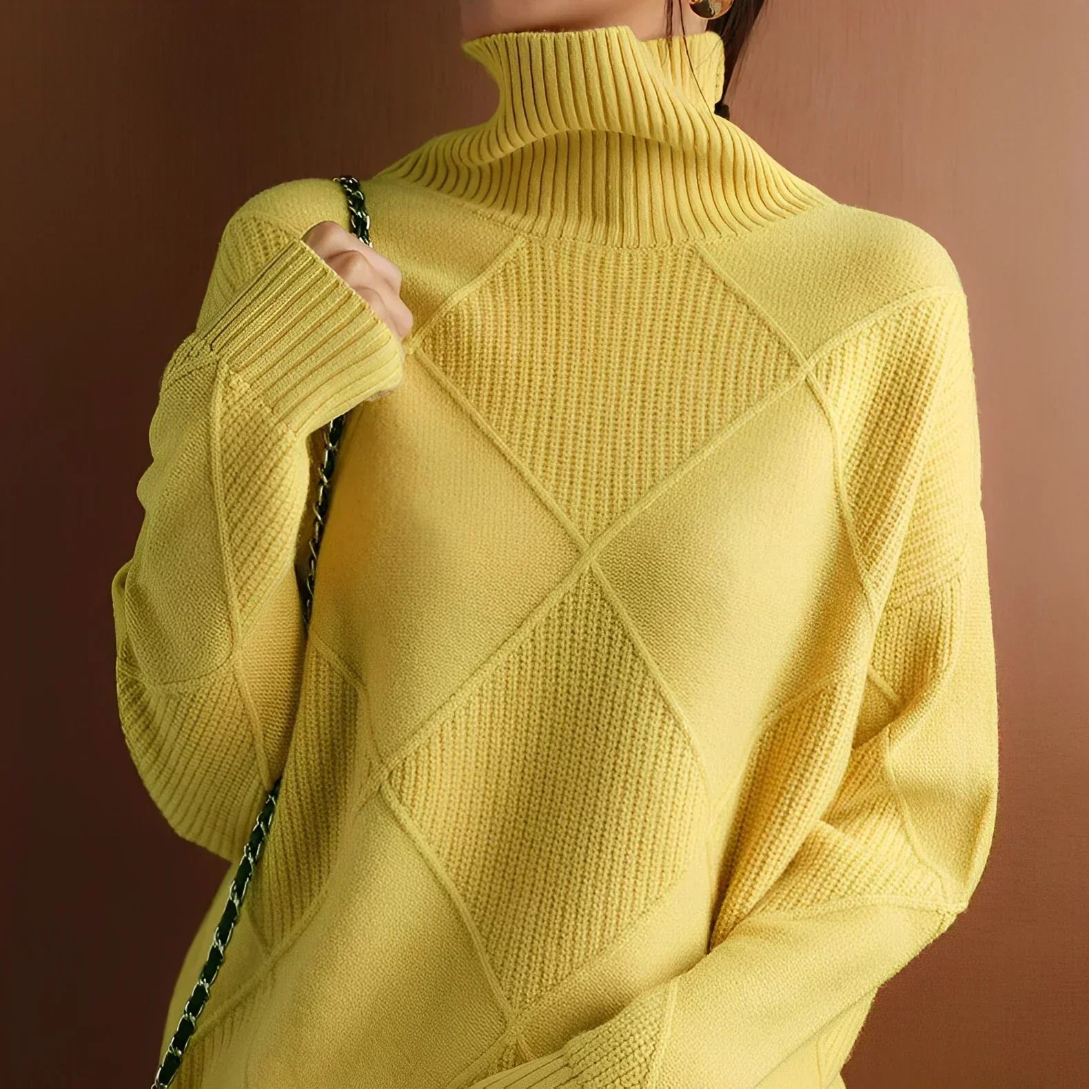 Women's textured knit turtleneck sweater, relaxed fit with raised geometric pattern, elegant cozy style