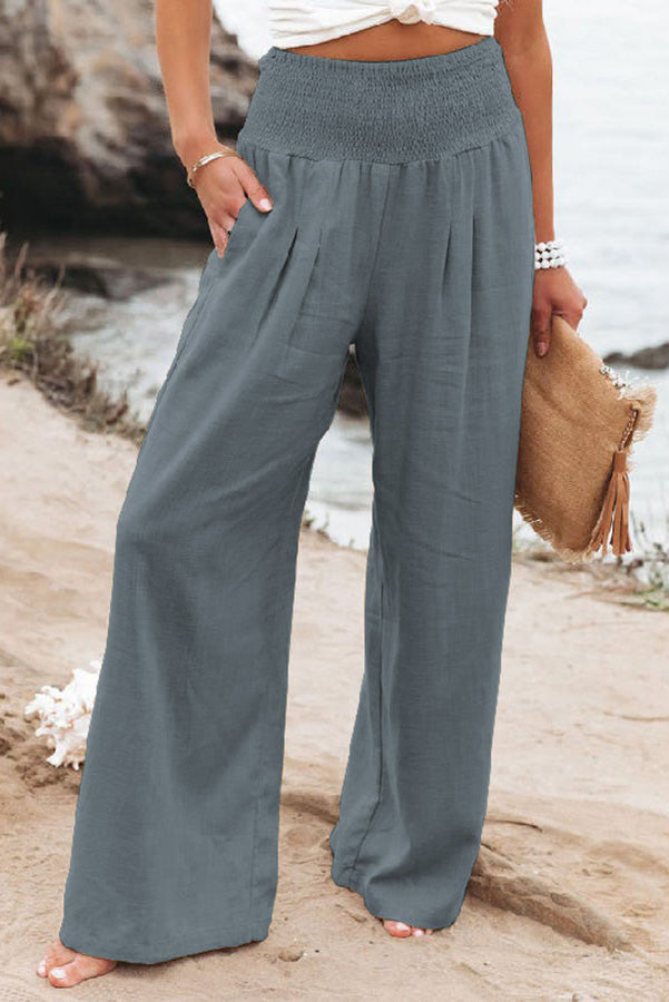 Women's wide leg vacation trousers in flowing silhouette, lightweight breezy fabric for beach travel