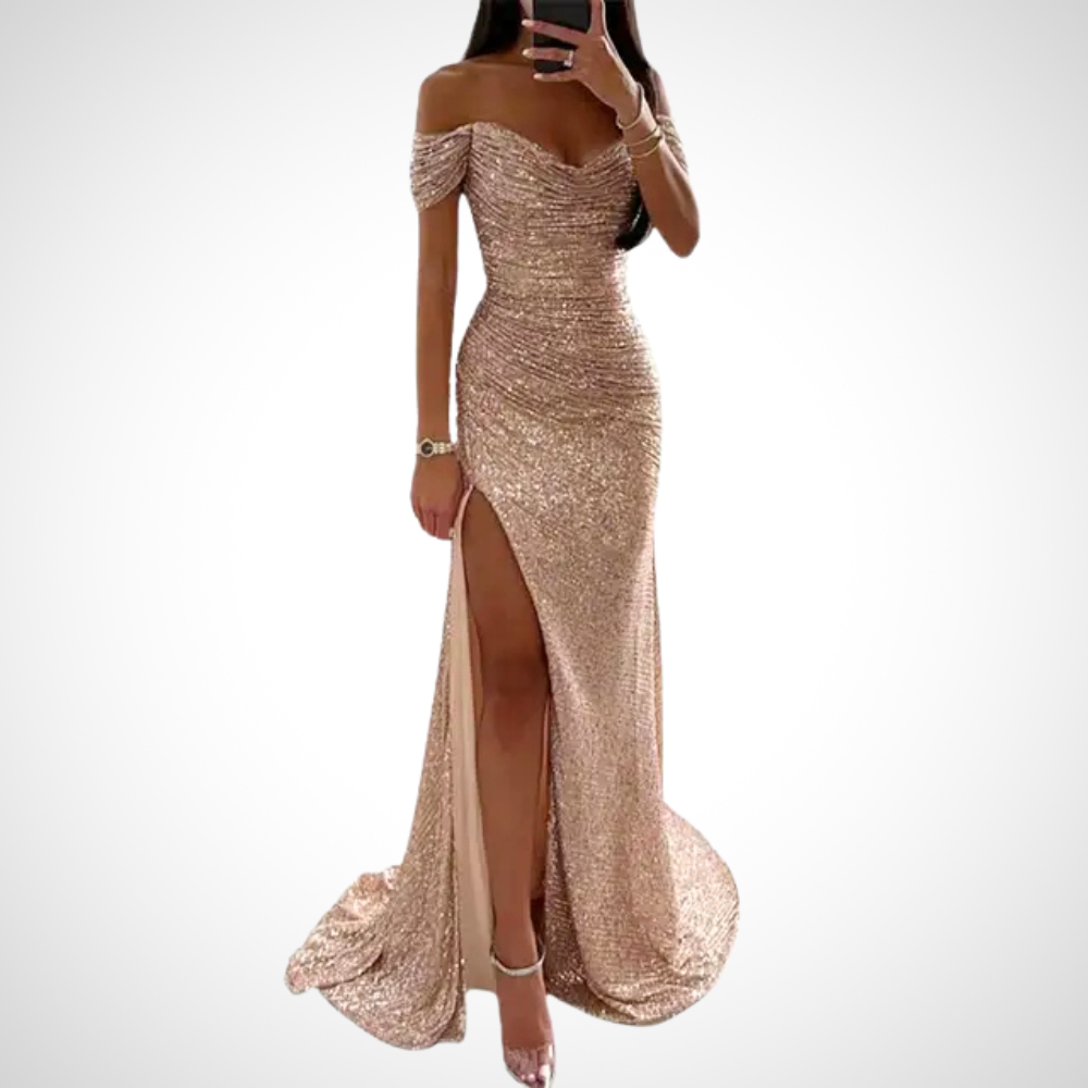 Ivory strapless evening gown with long fluid silhouette and shoulder-baring neckline