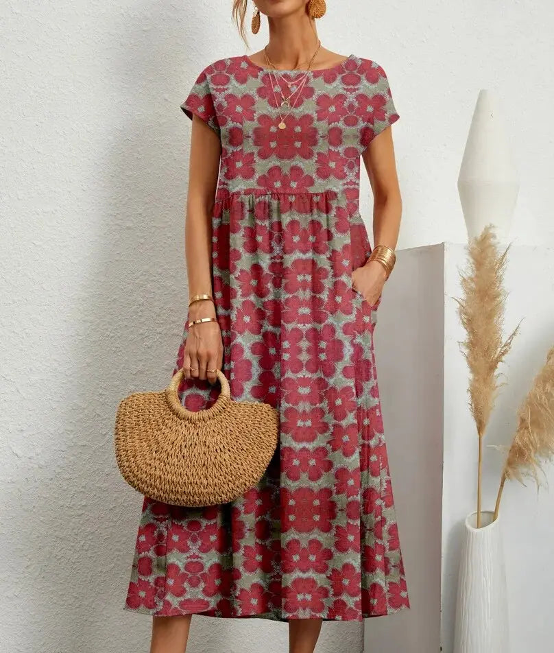 Women's floral print A-line cotton dress with round neckline and short sleeves, flattering long skirt