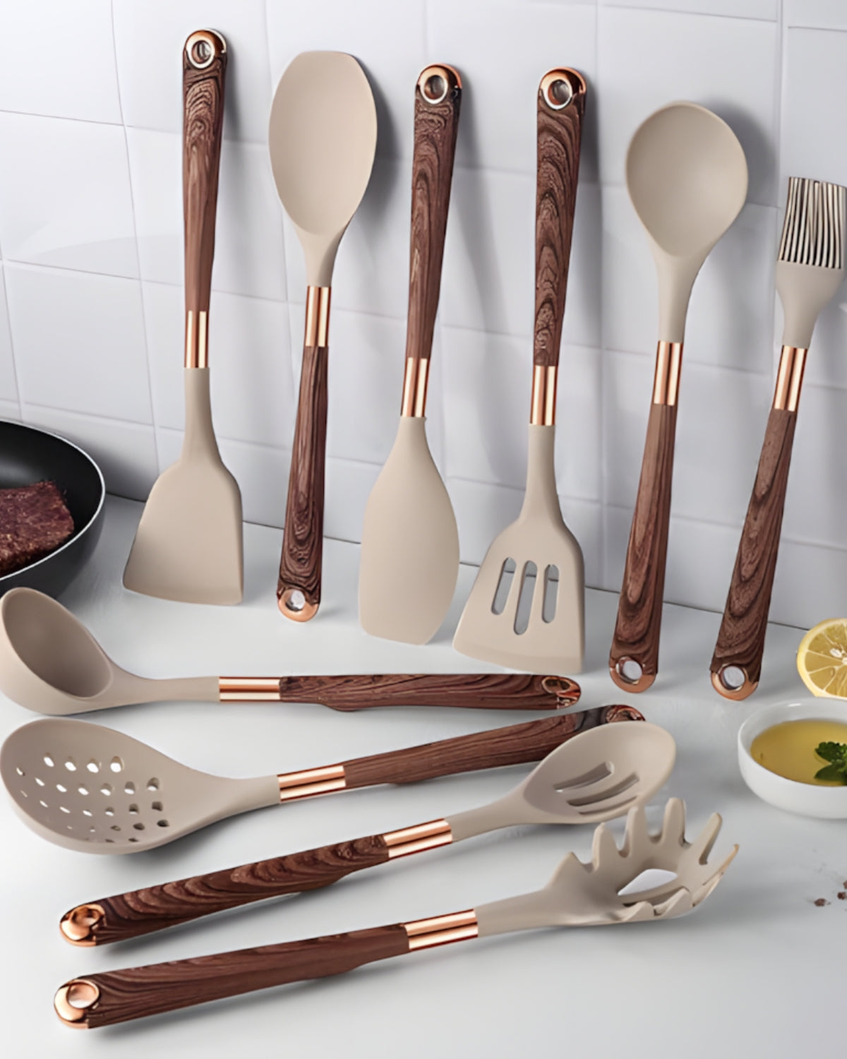 Cuivra 11-piece non-stick silicone utensil set with faux wood handles and metallic accents