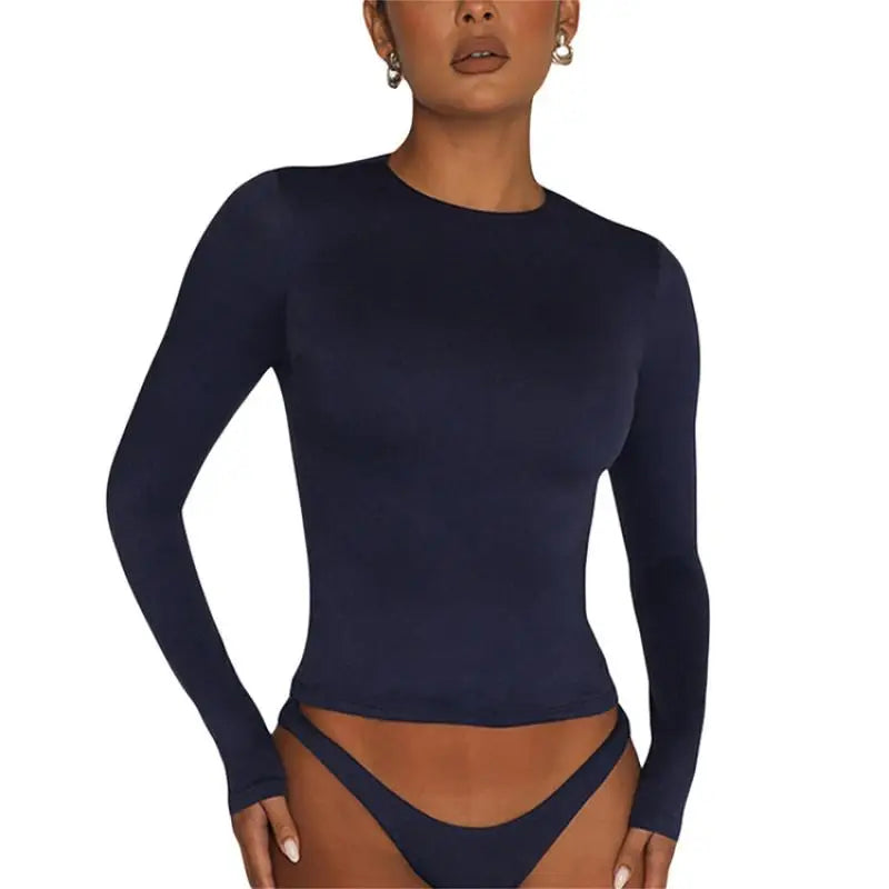 Women's long-sleeve crop top soft breathable fabric flattering cropped silhouette versatile everyday style