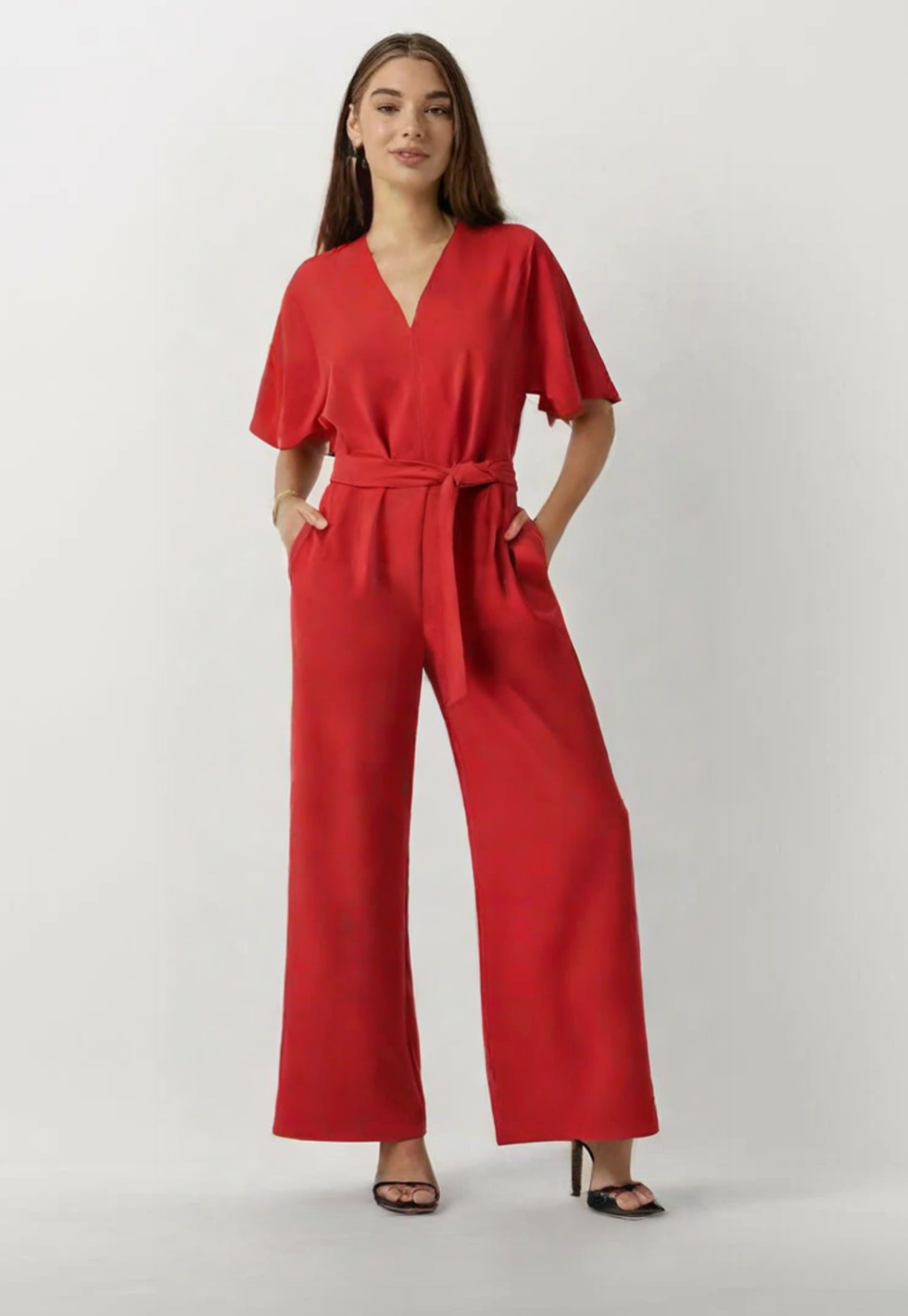 Women's black chic tailored jumpsuit flattering silhouette elegant one-piece for evening events