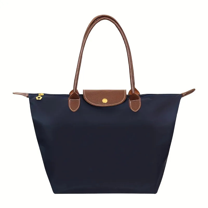 Aria foldable nylon tote bag with faux leather handles, elegant compact design for office and city use