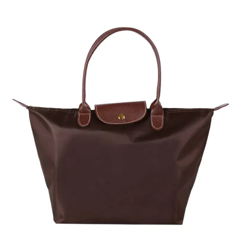 Aria foldable nylon tote bag with faux leather handles, elegant compact design for office and city use