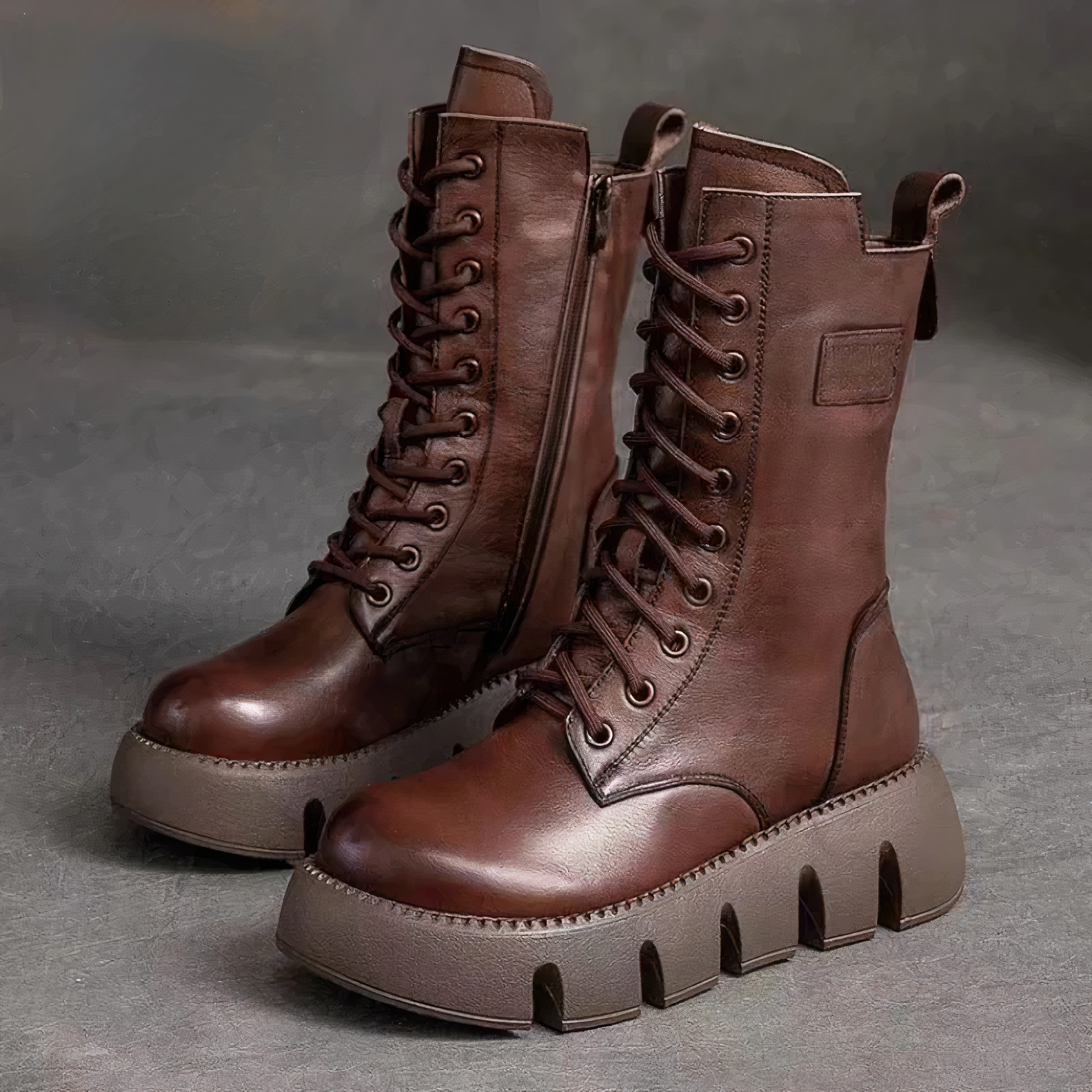 Women's black vegan leather ankle platform boots with sleek silhouette and comfortable chunky sole