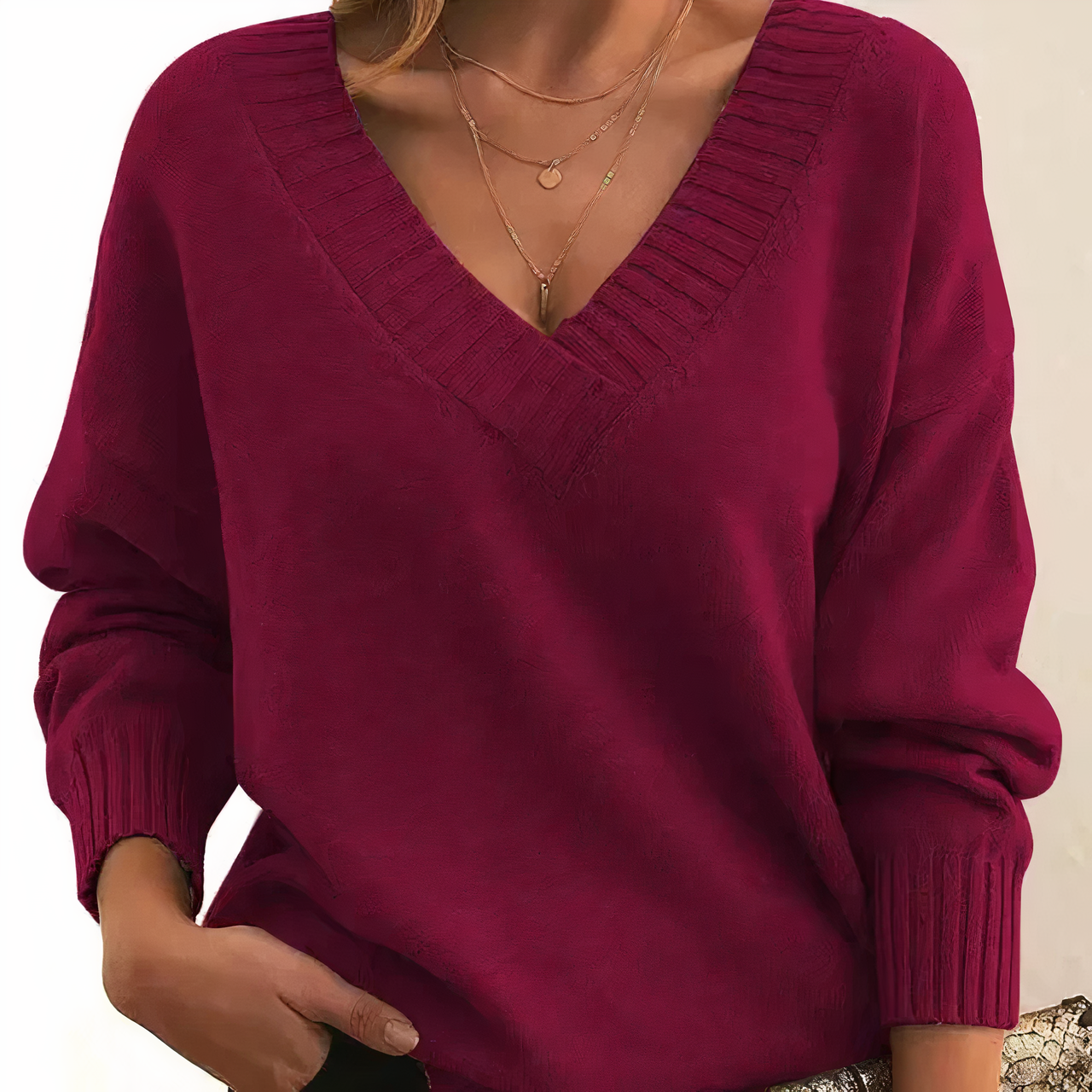 Women's elegant minimalist V-neck long sleeve sweater in neutral tone, versatile everyday layering piece