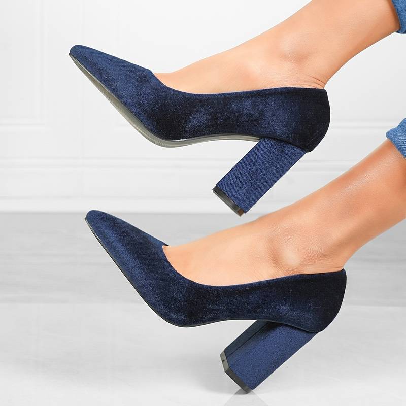 Women's pointed toe block heel pumps in classic style, versatile for office and festive occasions