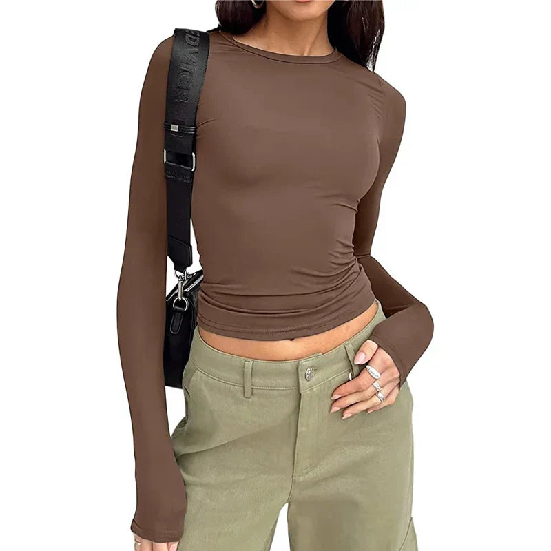 Women's long-sleeve crop top soft breathable fabric flattering cropped silhouette versatile everyday style