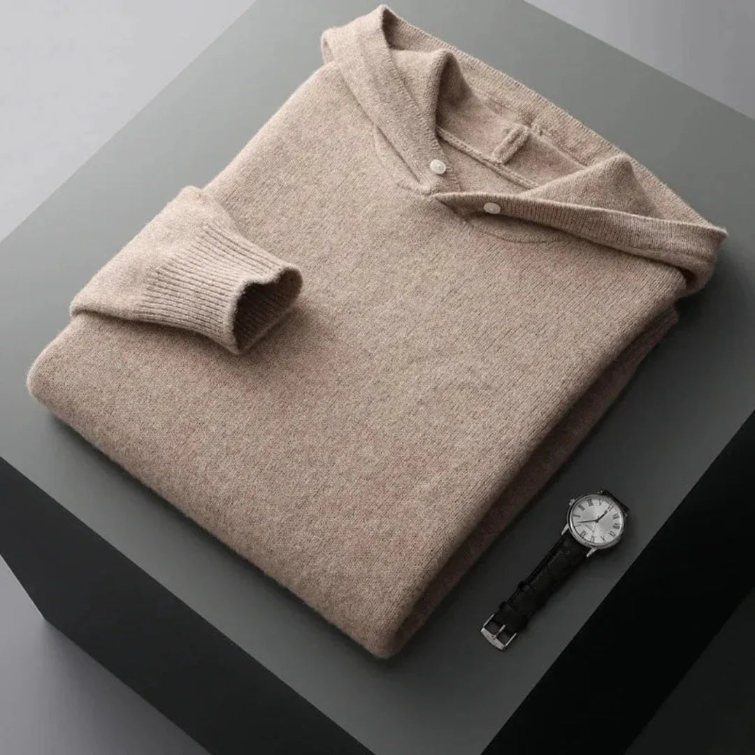 Unisex merino wool hoodie in neutral tone, relaxed fit with front kangaroo pocket and soft luxe finish