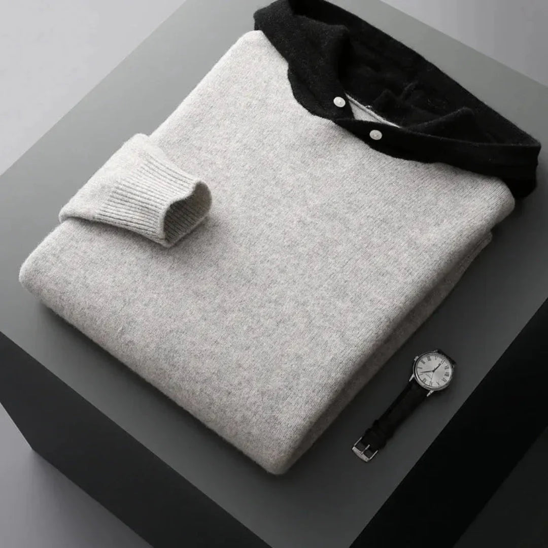Unisex merino wool hoodie in neutral tone, relaxed fit with front kangaroo pocket and temperature-regulating luxury feel