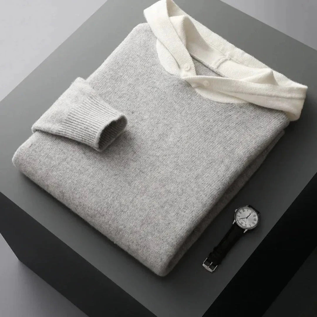 Unisex merino wool hoodie in neutral tone, relaxed fit with front kangaroo pocket and soft luxe finish
