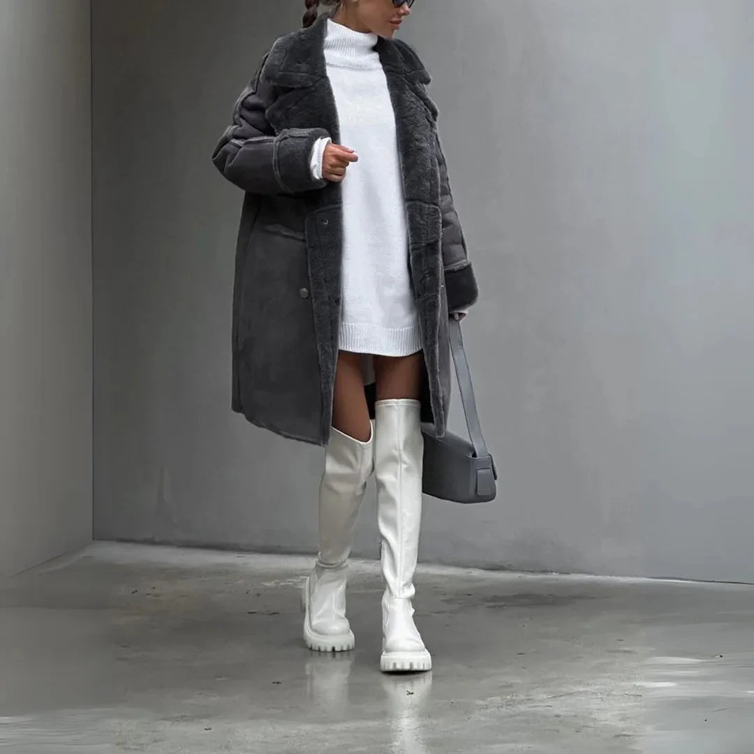 Women's beige faux shearling winter coat with plush lining and double-breasted button front closure