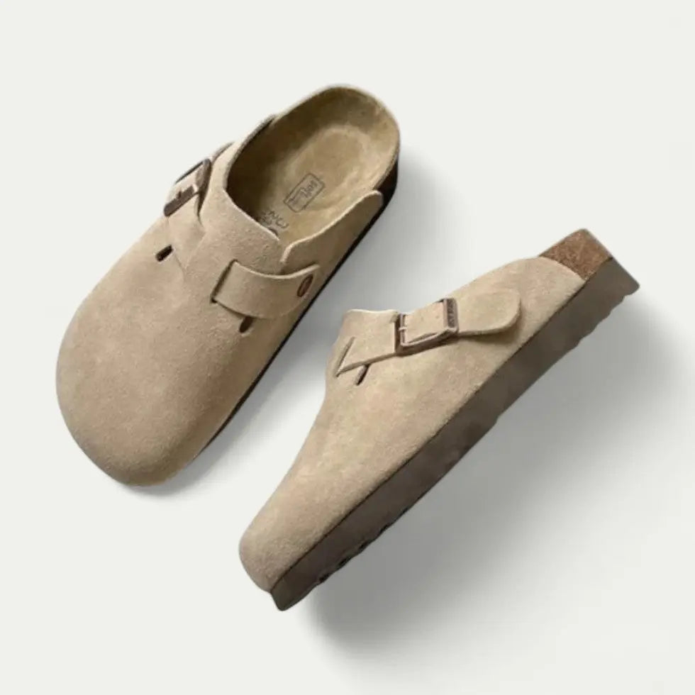 Women's tan vegan suede clogs with adjustable buckle strap and contoured cork-effect sole