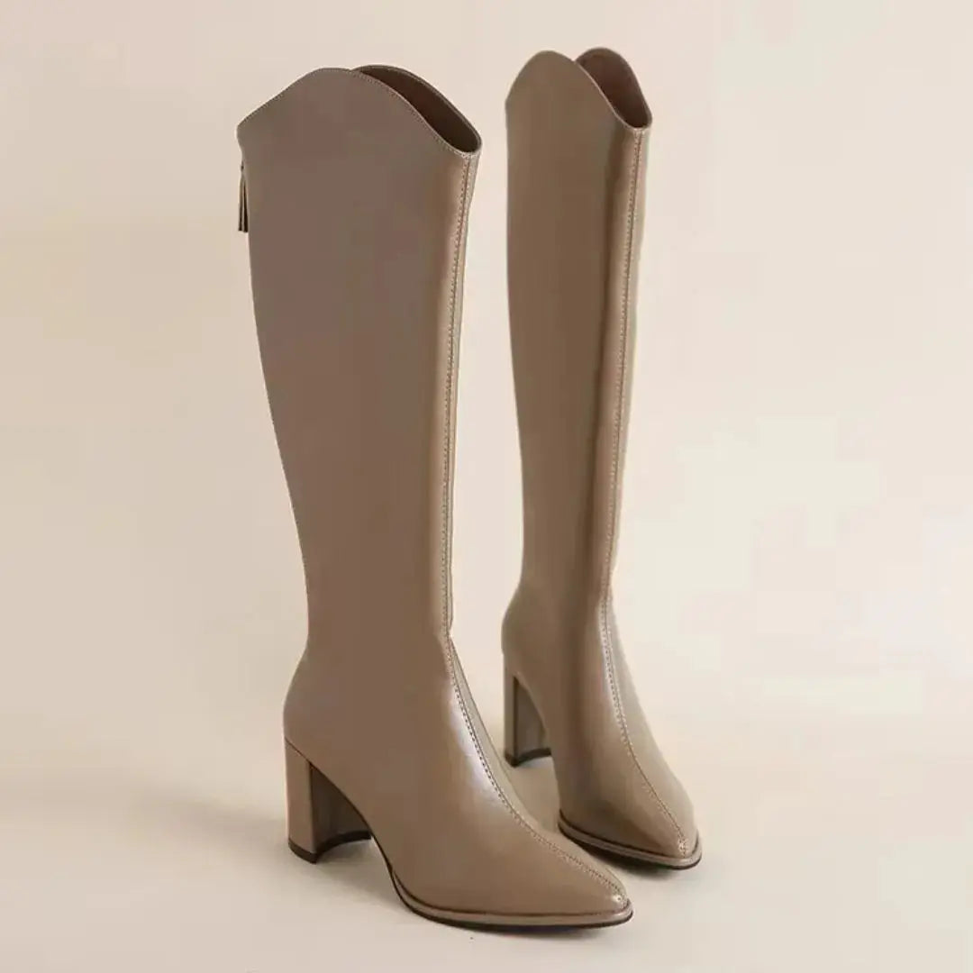 Women's black faux leather knee-high heeled boots pointed toe back zip sleek timeless silhouette