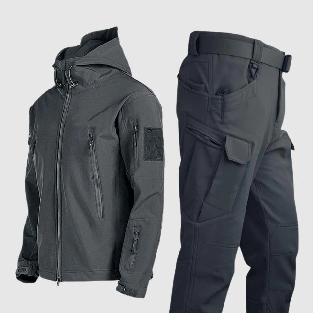 Men's olive tactical softshell jacket and reinforced pants set with zip pockets for hiking