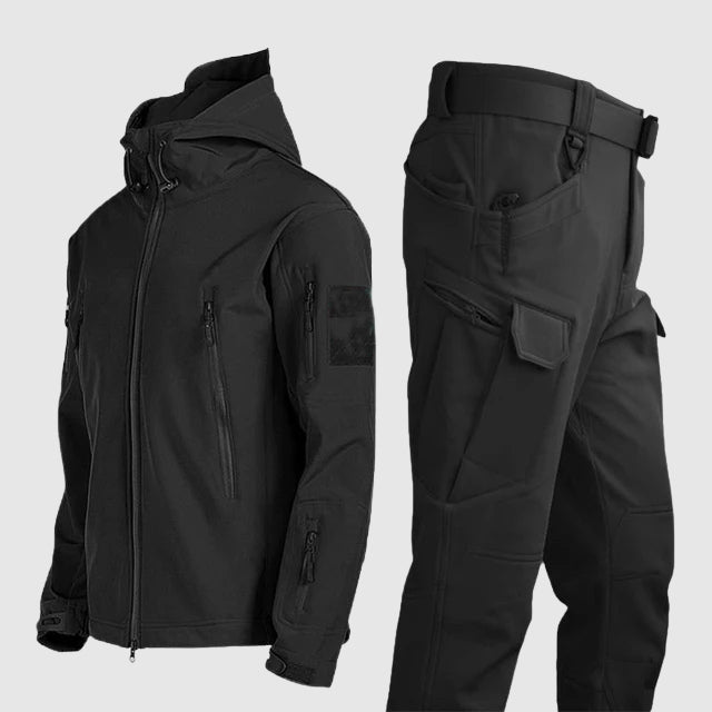 Men's black tactical softshell jacket and reinforced pants set with zip pockets for hiking