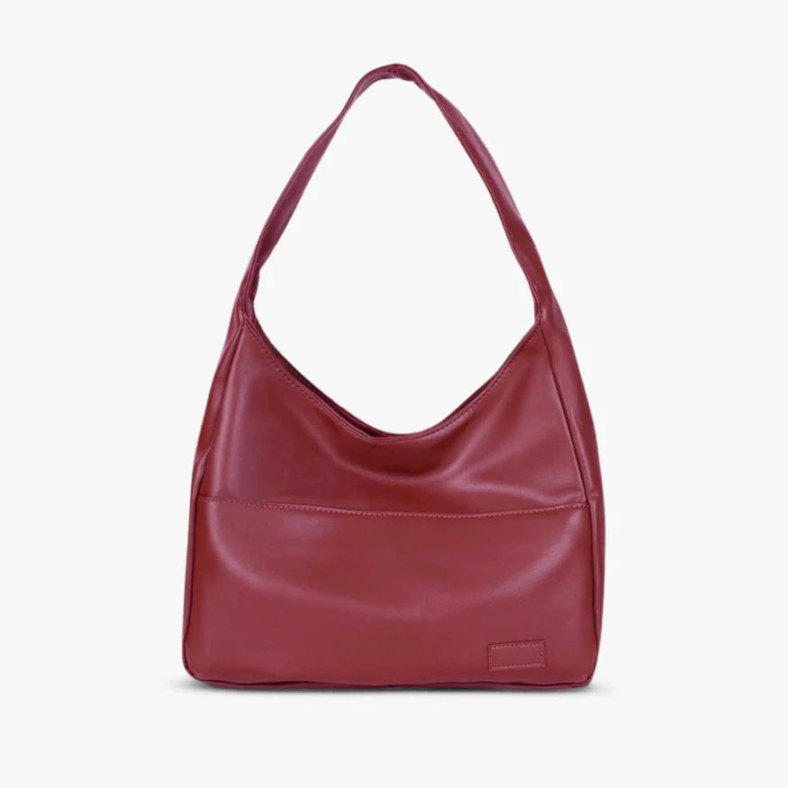 Women's smooth leather minimalist shoulder bag, elegant structured silhouette for day-to-night versatility