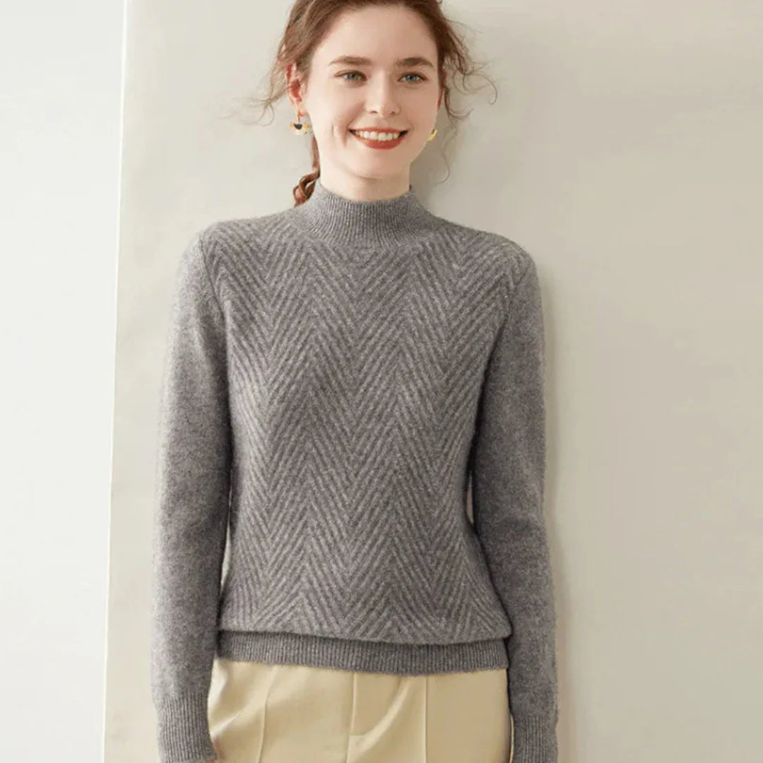 Women's ivory cashmere mock neck sweater with chevron knit pattern and sculpted slim fit