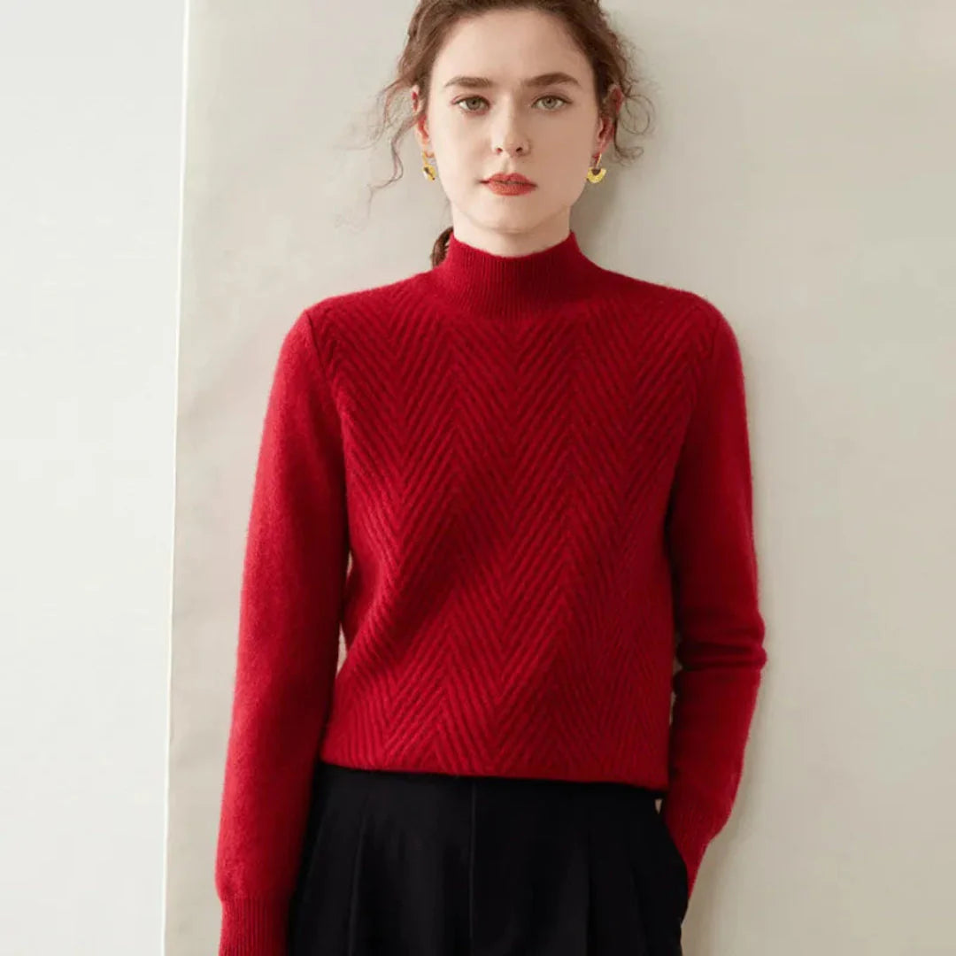 Women's ivory cashmere mock neck sweater with chevron knit pattern and sculpted silhouette