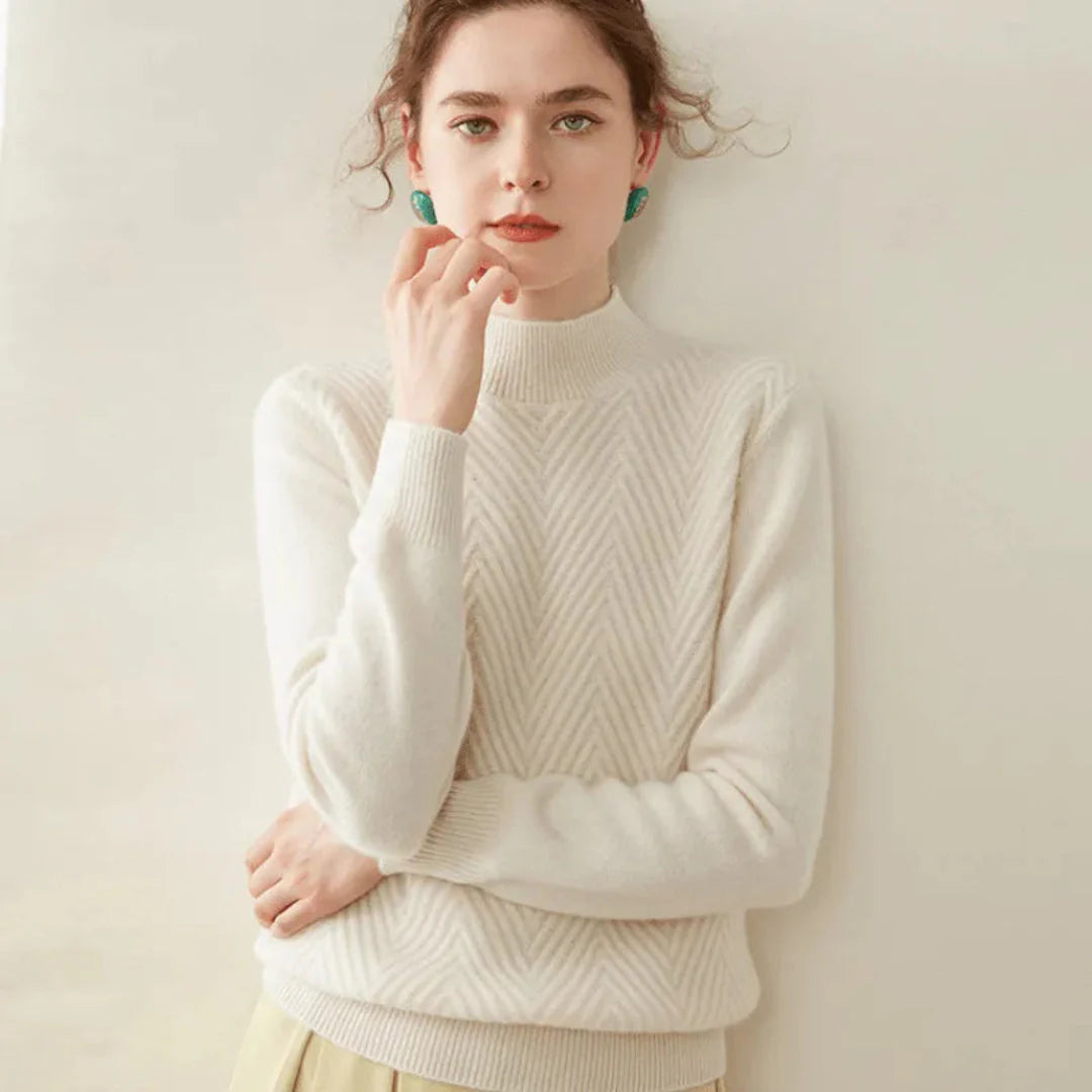 Women's camel cashmere mock neck sweater with chevron knit pattern and sculpted silhouette