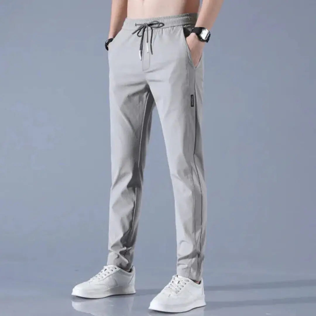 Men's slim fit gray StretchTech jogger pants lightweight quick-dry drawstring athleisure tapered silhouette