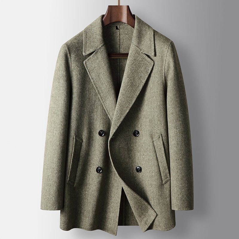 Men's dark wool double-breasted coat with broad lapels, tailored structured fit for cool weather