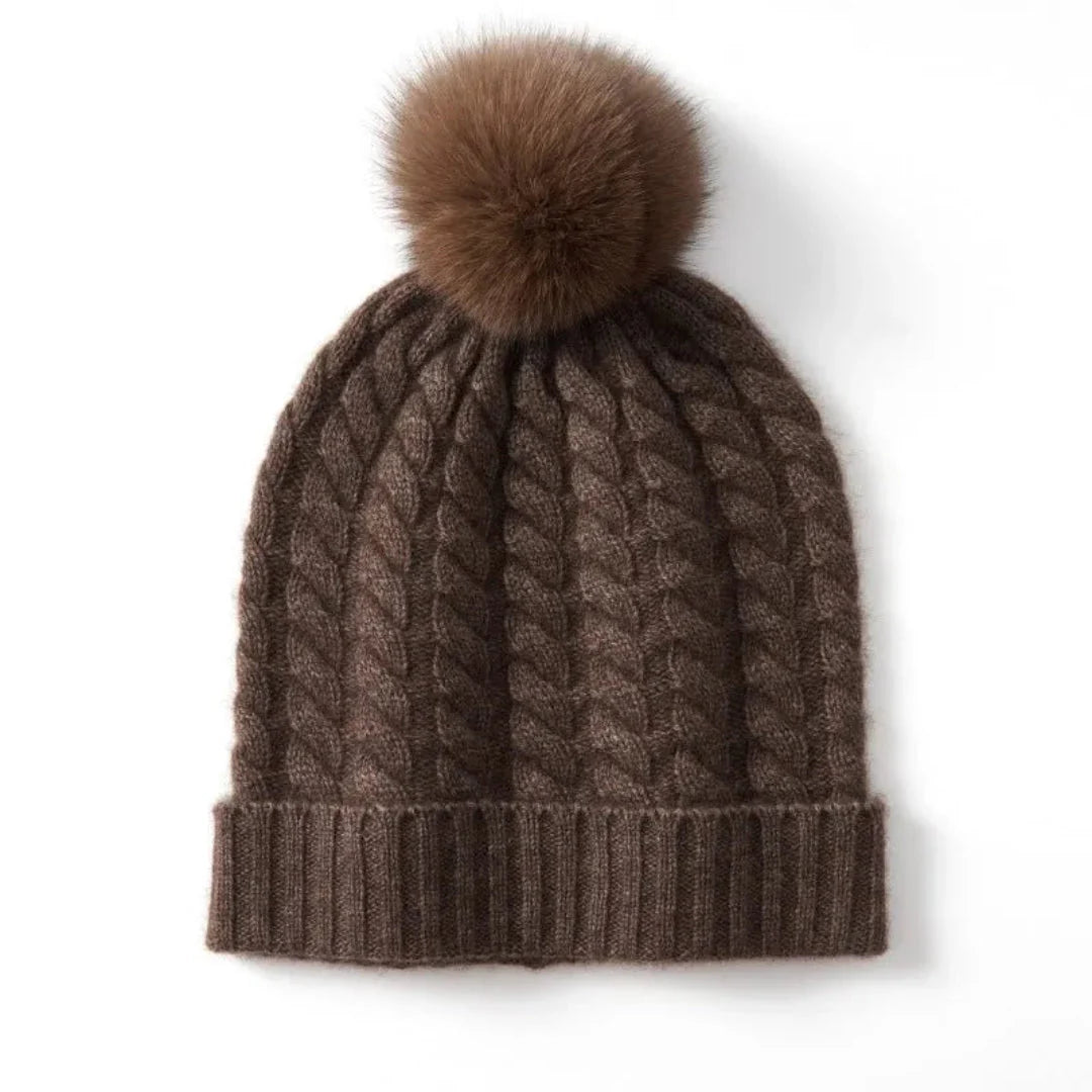 Women's ivory cashmere cable knit beanie with plush fur pom, ultra-soft luxurious cold-weather hat