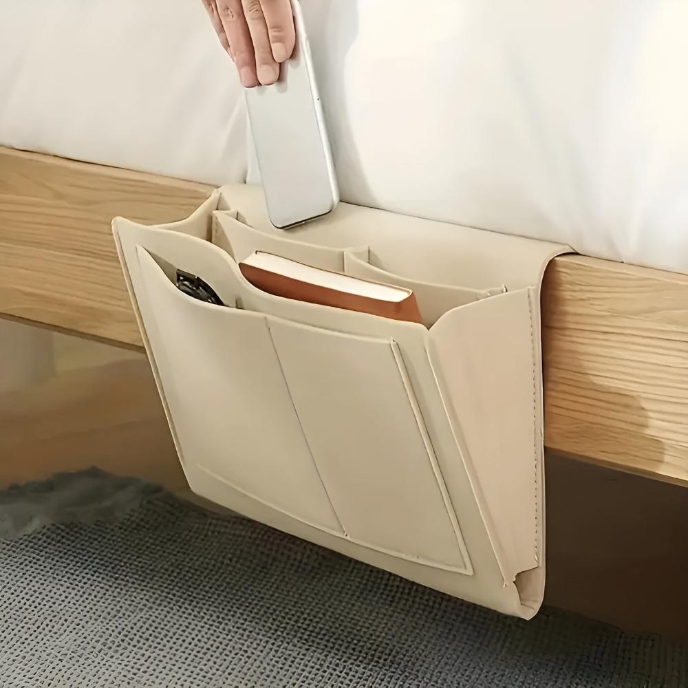 Minimalist felt bedside pocket organizer in neutral tone with slim profile for tablet and phone storage