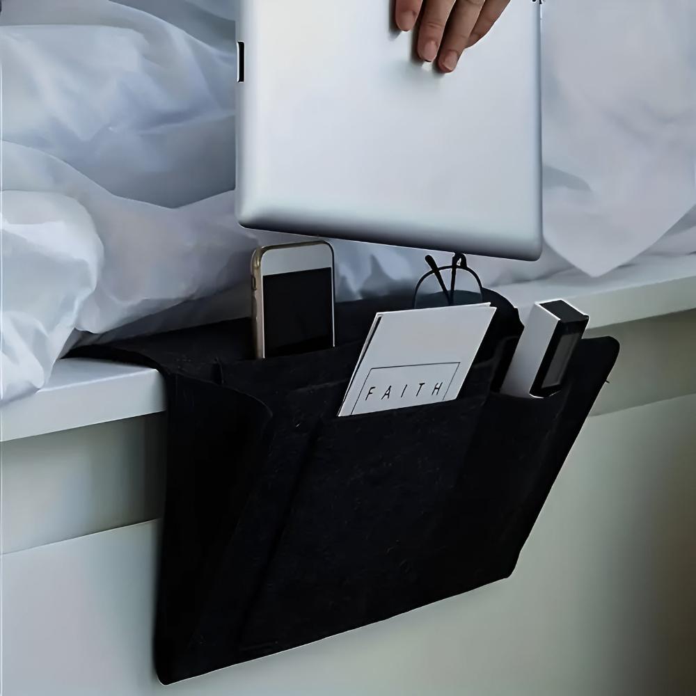 Minimalist felt bedside pocket organizer in neutral tone, slim design holds tablet and phone within reach