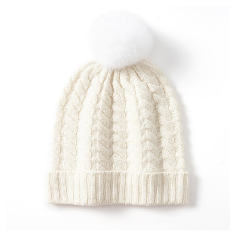 Charcoal gray cable-knit wool blend beanie with oversized pom-pom, unisex winter hat