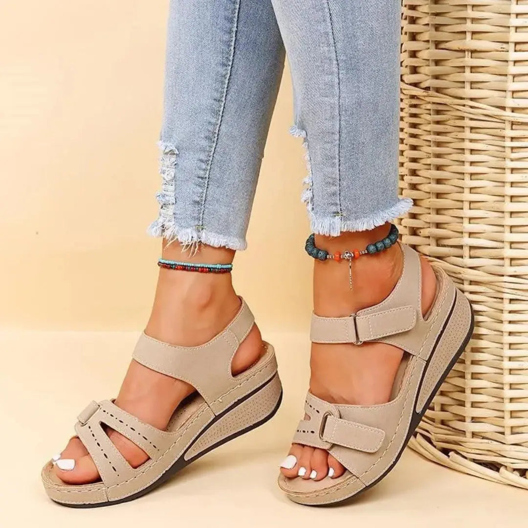 Women's beige orthopedic wedge sandals with arch support insole and adjustable velcro strap closure