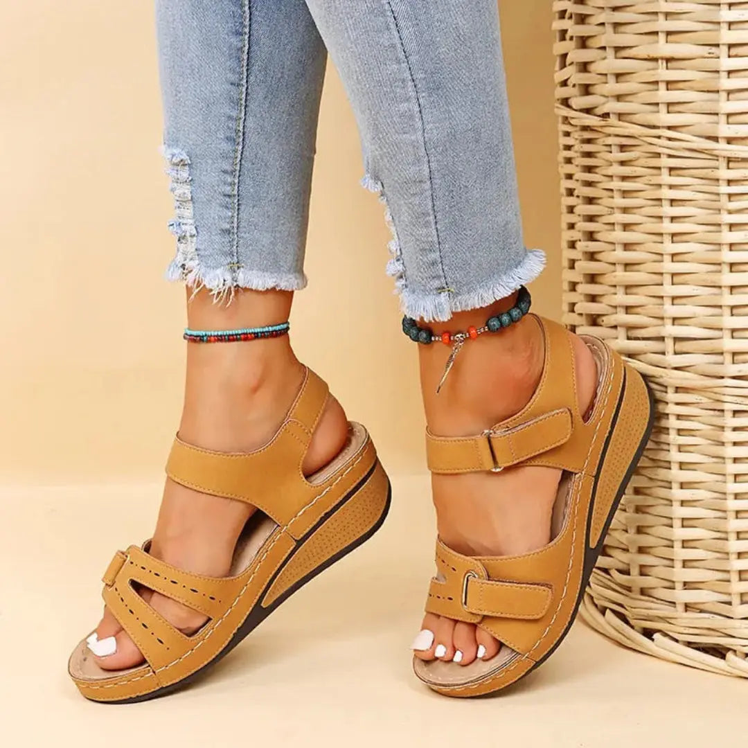 Women's beige orthopedic wedge sandals with arch support insole and adjustable velcro strap closure
