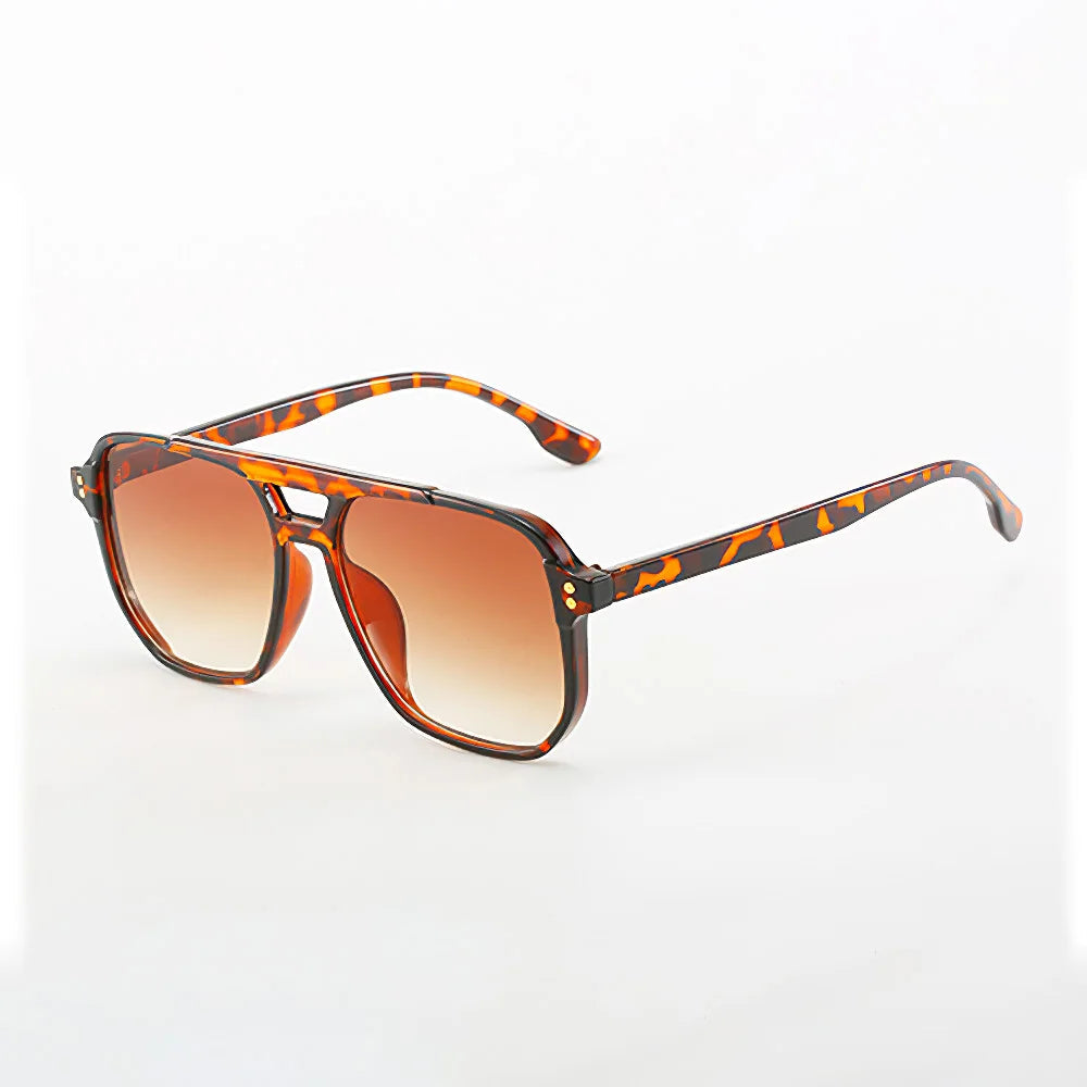 Bold retro tortoiseshell acetate eyewear with amber gradient UV400 lenses for everyday style