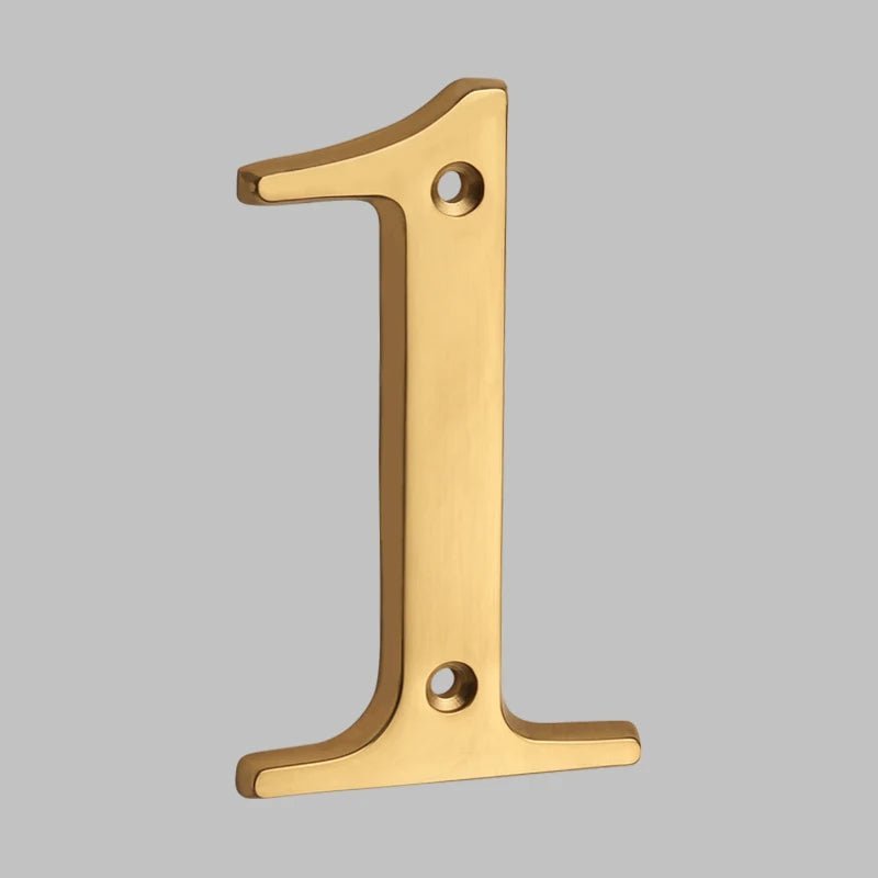 Solid brass oval house number sleek modern exterior address marker with timeless architectural finish