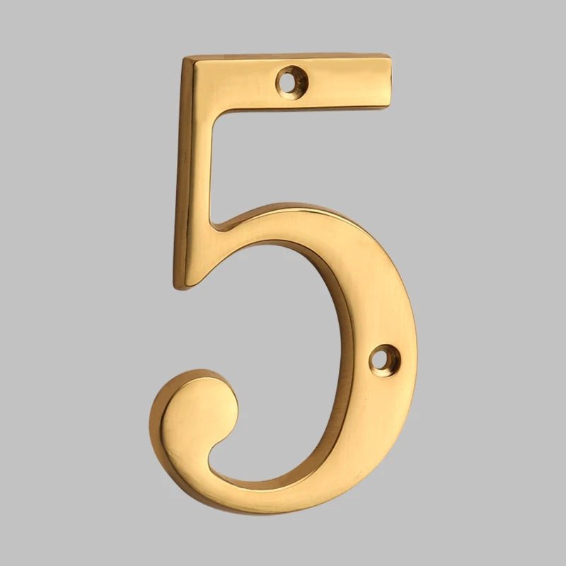 Solid brass oval house number sleek modern exterior address marker with architectural finish