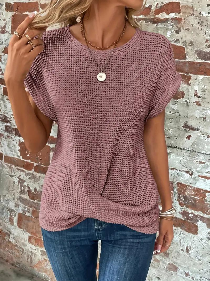 Women's white waffle knit relaxed tee with front twist hem detail for casual everyday wear