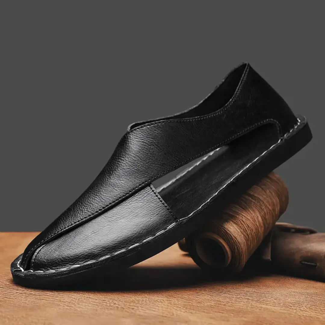 Men's brown handcrafted leather cross strap sandals with ergonomic footbed and slip-resistant sole