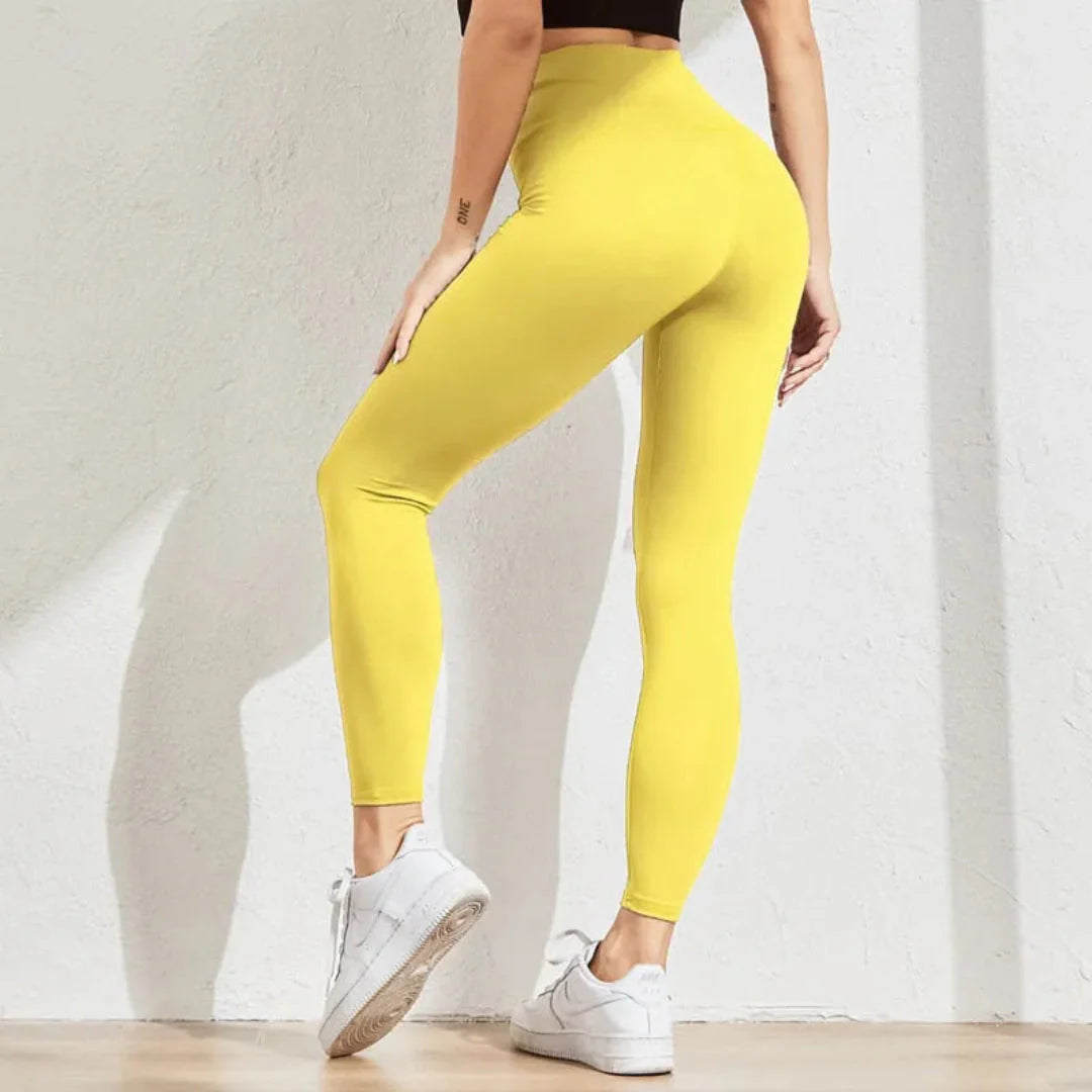 Women's black high-waist seamless compression leggings with sculpting fit for gym and everyday wear