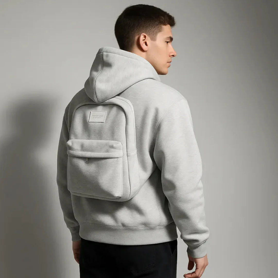 Black minimalist hoodie with built-in backpack hidden storage, premium polyester casual travel layer