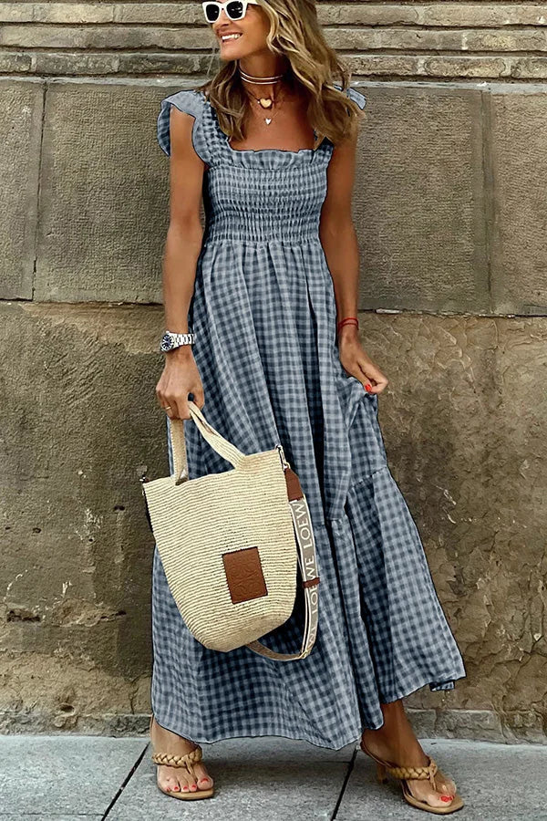 White sleeveless maxi dress with romantic ruffle straps, elegant strapless silhouette for summer events